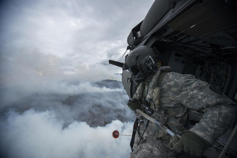 Photo of Alaska Army National Guardsman fighting a wildfire in Alaska