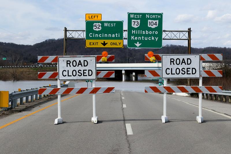 Road closure signs due to submerged roadways in Ohio